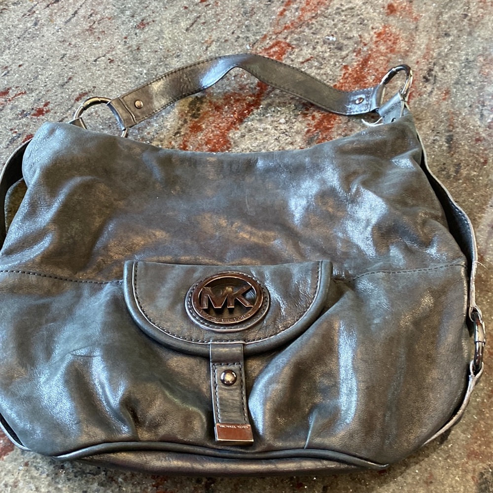 Beautiful pre-loved Michael Kors bag in a soft dark gray color.